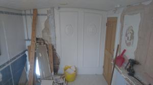 bathroom being stripped for conversion into two separate ensuites