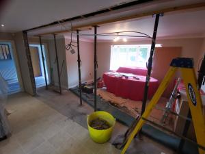 Internal wall removed, props supporting ceilings, ready for steels