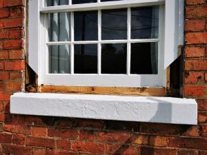 Sash window with failed sections removed