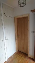 White primed Dordogne door hallway cupboards with oak Dordogne adjacent