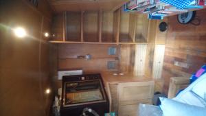 Juke box housing and shelving formed in canal boat