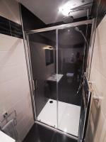 replacing a tiled shower enclosure with aqua boards