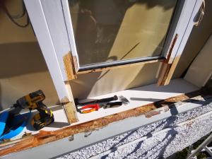 Flush window casement having failing woodwork removed
