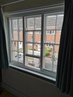 freeing a previously sealed sash window opener and fitting new beads