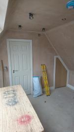 Loft doorway and storage cupboard
