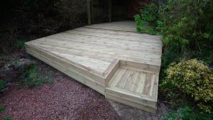 Large garden decking platform and integrated step