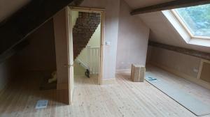 Pine loft door with pine T&G flooring
