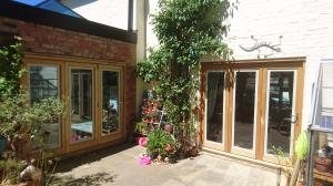 refurbishing well-weathered oak bi-fold doors