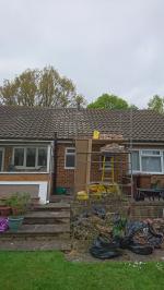 Bungalow chimney removal, roof tiled and chimney gone