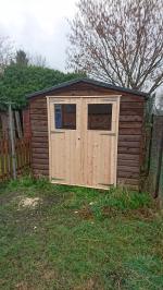 Redwood matchboard and glazed doors for a garden shed