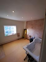 Master bathroom going through refurbishment in 1820's property, stripped of tiles and ply being laid for tiling