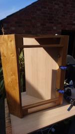 Oak veneered mdf corner cupboard built to match existing kitchen