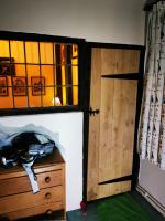 Wardrobe formed in a 400 year old property adding an oak rustic door on tee hinges