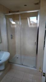 New doors on a shower enclosure to tidy an old suite