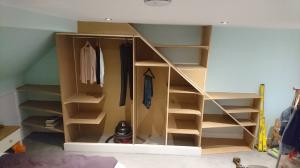 Very unique wardrobe as imagined by the client with space for record player and vinyl