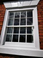 Sash window having had box bases, new cill and frame trims, primer and two coats of white gloss