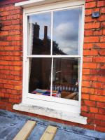 Replacement outer cill in a sash window casement