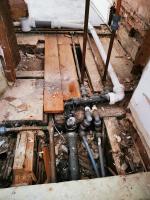 A nest of old pipework to be reconfigured in 1820's property