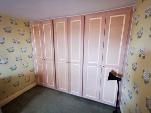 Victorian shaker style wardrobes in an historic property