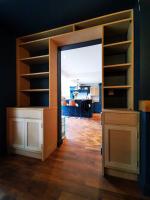 Built-in over-doorway bookcase and cupboard set