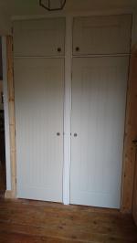 White primed Dordogne door hallway cupboards
