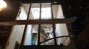 Loft view of bathroom and toilet being stripped for refurbishment