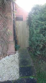 Framed, ledged and braced gate finished in pressure treated feather edge board