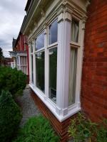 New corner posts and lower sections in a bay window