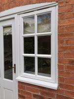 Replacement glass and window repairs in grade 2 listed property