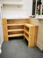 Pine shoe rack in a porch