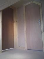 Flush ply doors fitted into angled loftspace doorways