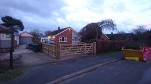 Feather edge board fence and double five-bar gate