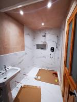 Newly formed bathroom having plumbing second fix