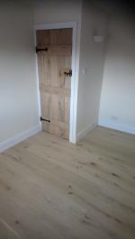 Rustic oak floor and door