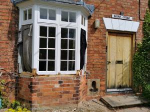 Bay window partially dismantled awaiting replacement frame sections