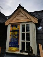 Replacing cladding timbers of a dormer and failing sections of stormproof windows