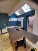 Following a ground floor extension, the Sea Foam shaker kitchen is being reinstalled and extended too
