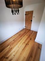 Laying rustic oak flooring over lime ash floors in 200 year old property