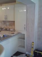 Continuing an existing cream gloss kitchen into new extension