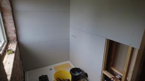 Studwork being formed to split one bathroom into two