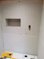 Forming a modern looking shower area with shelf