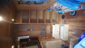 Juke box housing and shelving formed in canal boat