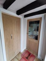 Oak glazed Dordogne door and genoa bi-folding doors
