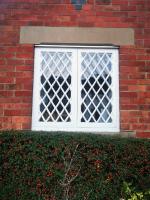 Lattice-work window casement ready for replacement