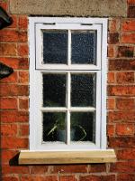 Wooden window casement under refurbishment